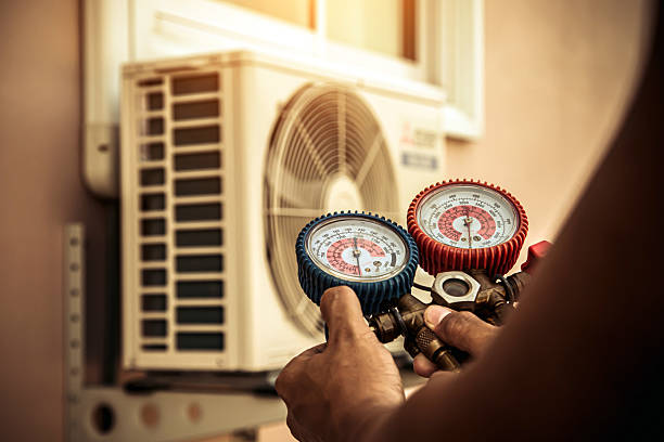 Professional Heat Pump Repair technician working in Vanderbilt, PA